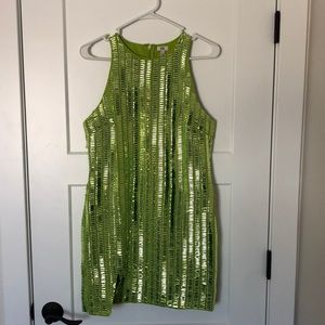Bright green mini dress with shines beading detail and 4 inch slit